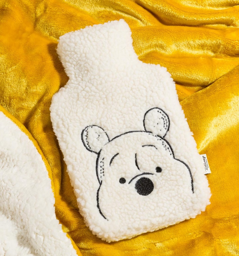 An image of Disney Winnie The Pooh Hot Water Bottle from Mad Beauty