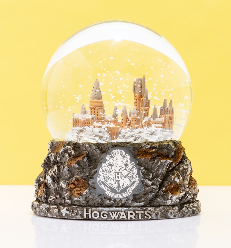 An image of Harry Potter Hogwarts School of Wizardry Snow Globe
