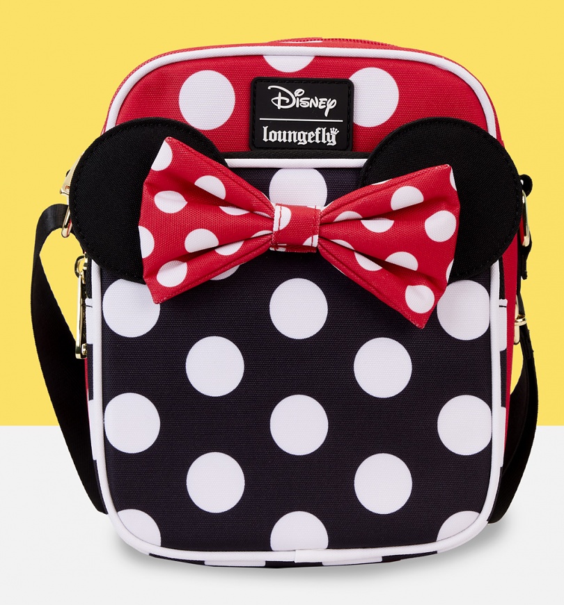 An image of Loungefly Disney Minnie Rocks The Dots Nylon Passport Cross Body Bag