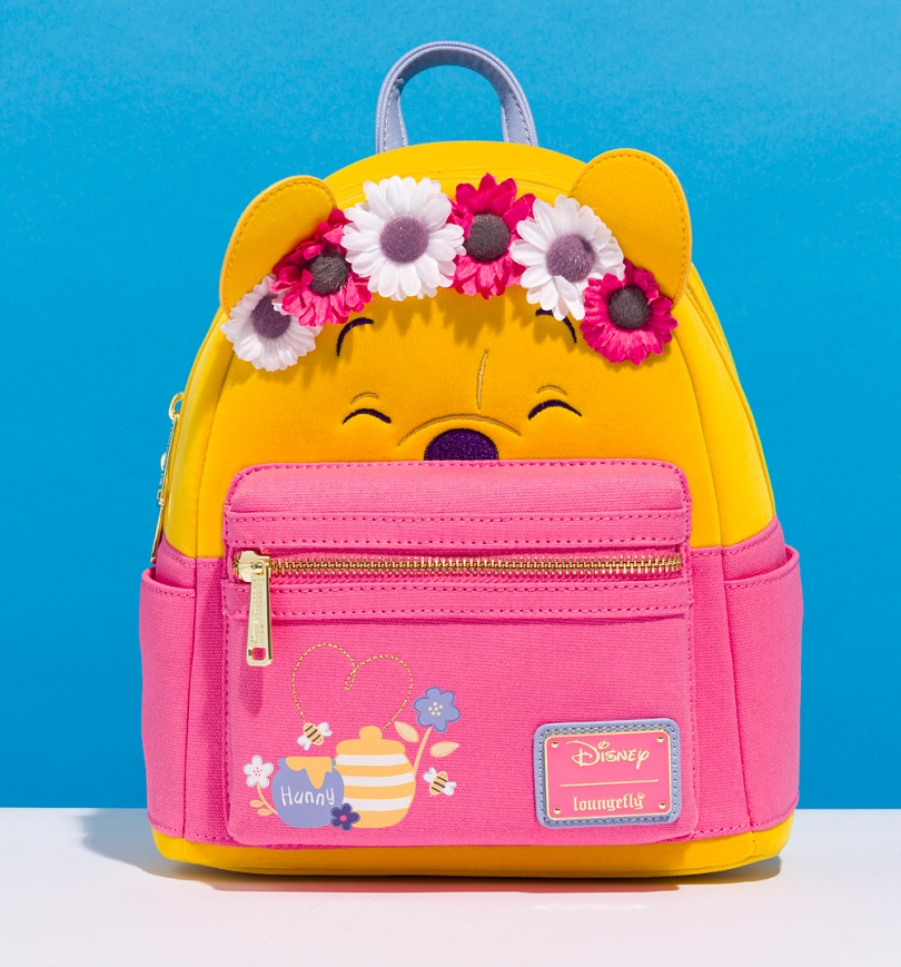 An image of Loungefly Disney Winnie the Pooh Flower Crown Mini Backpack