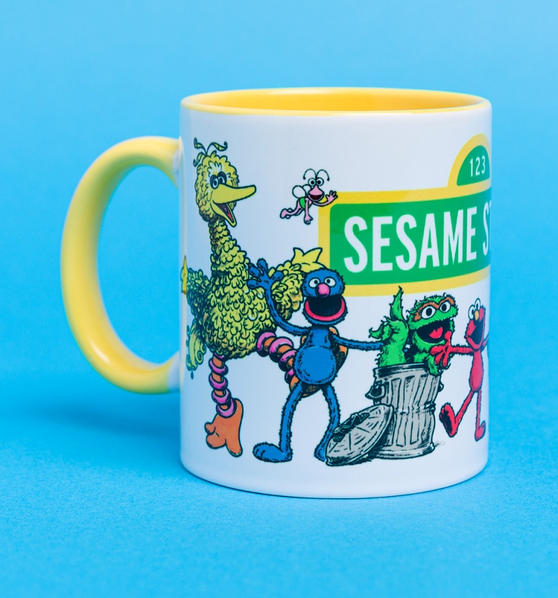 An image of Sesame Street Characters Yellow Handle Mug