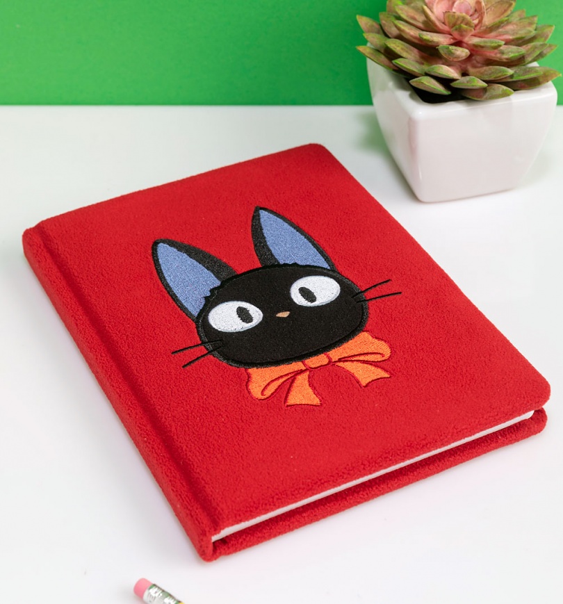 An image of Studio Ghibli Kikis Delivery Service Jiji Plush Notebook